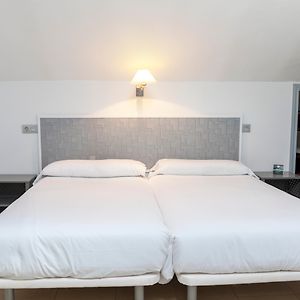 Habitación con 2 Camas Individuales